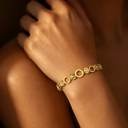 Elegant gold circle crystal bracelet for women featuring modern circular links and sparkling crystal accents.