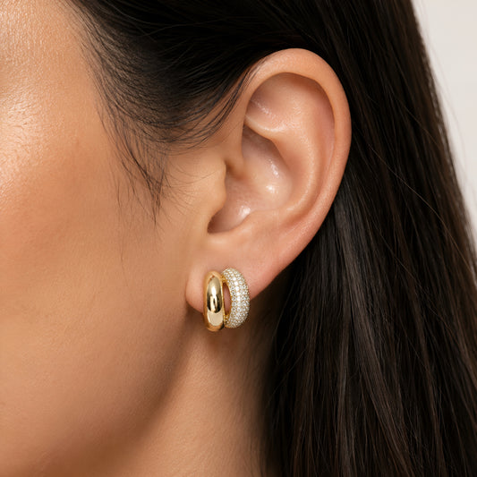 Woman wearing anti tarnish gold toned dual tone push back earrings with polished and sparkling finish by MahanandaFJ Atelier.