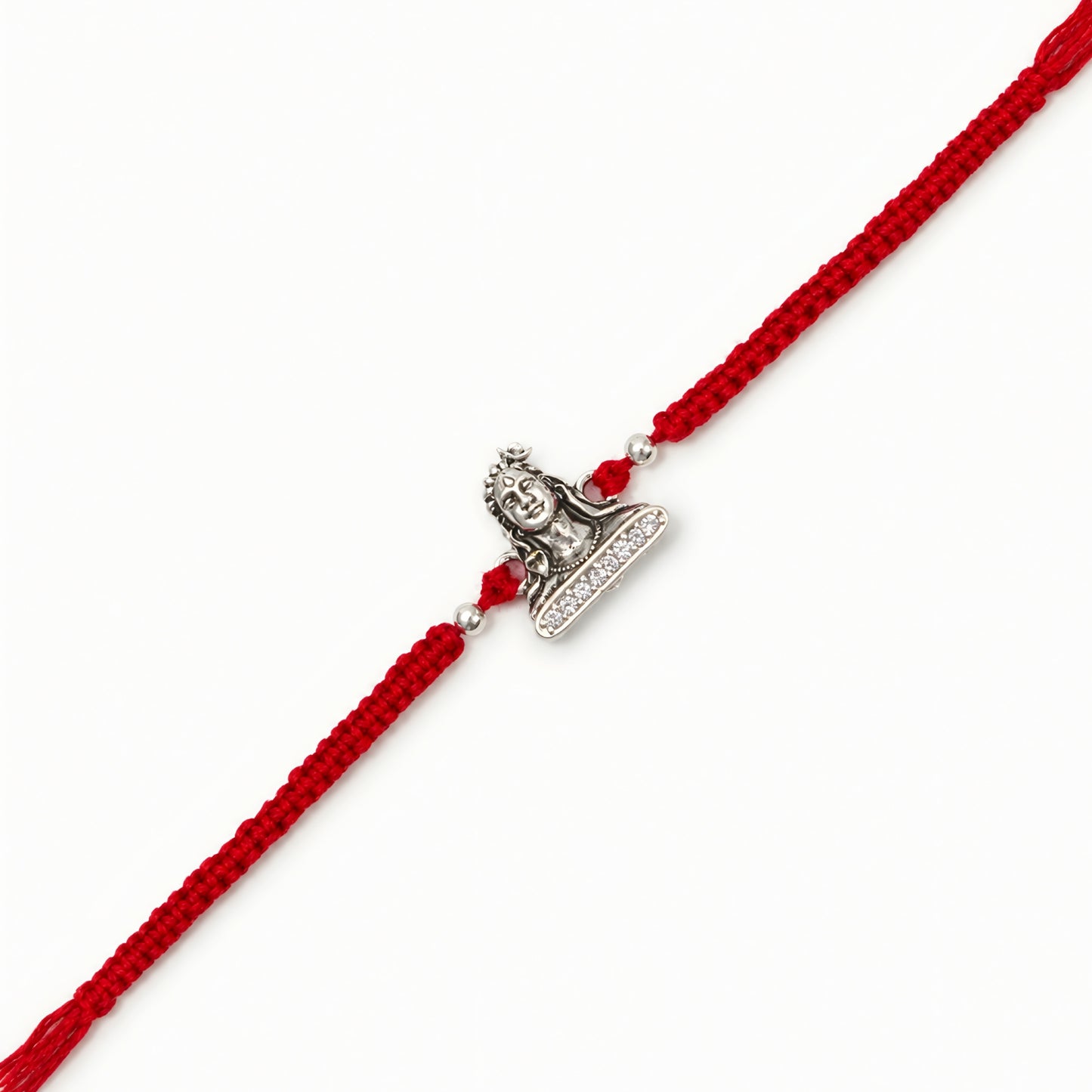 Silver Adiyogi stone Rakhi with Lord Shiva centerpiece and adjustable red thread for brother on Raksha Bandhan