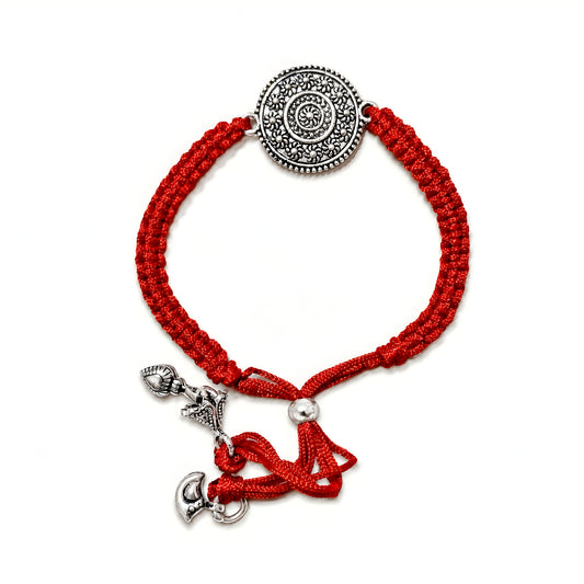 Sterling Silver Mandala Lumba Rakhi for Bhabhi with antique floral medallion, red woven thread and hanging silver charms