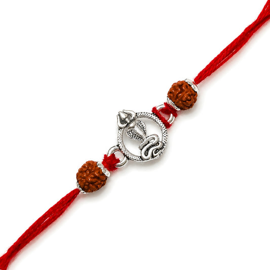 Silver Mahadev Trishul Rakhi with serpent motif, original Rudraksha beads and red thread for Raksha Bandhan