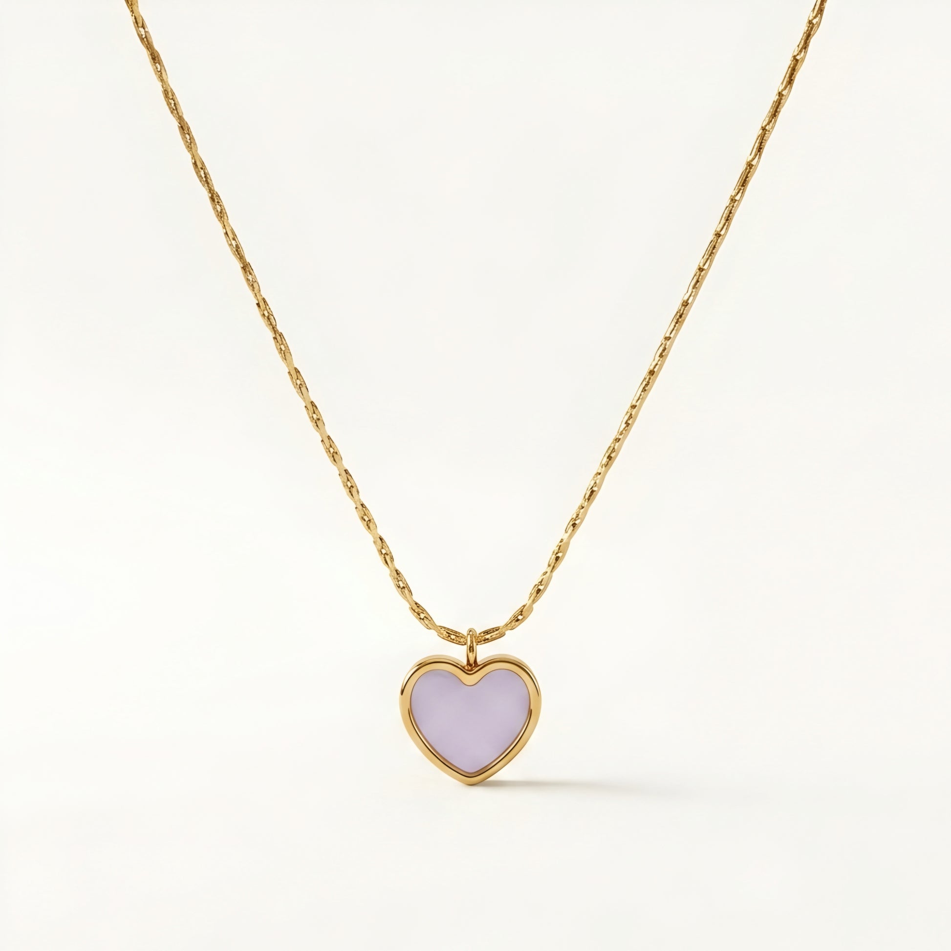 Lavender heart pendant necklace with a gold-tone chain, elegant minimalist daily wear jewellery for women.