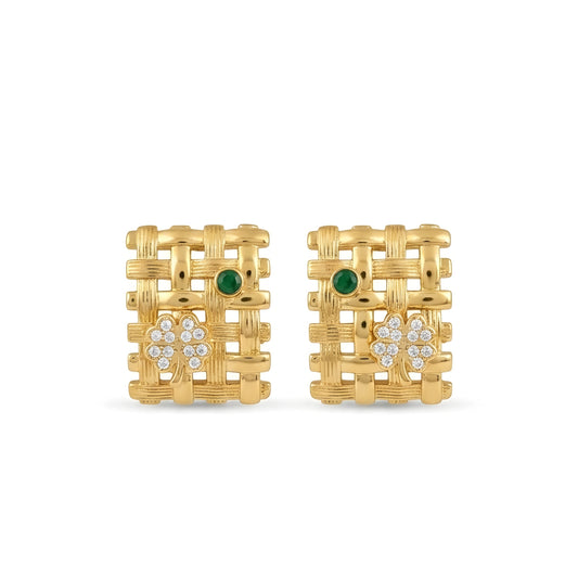 Woman wearing anti tarnish gold toned geometric push back earrings with green stone detail by MahanandaFJ Atelier.