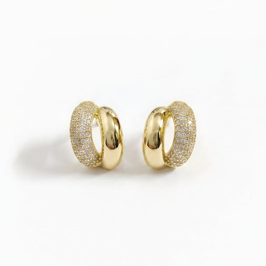 Woman wearing anti tarnish gold toned dual tone push back earrings with polished and sparkling finish by MahanandaFJ Atelier.