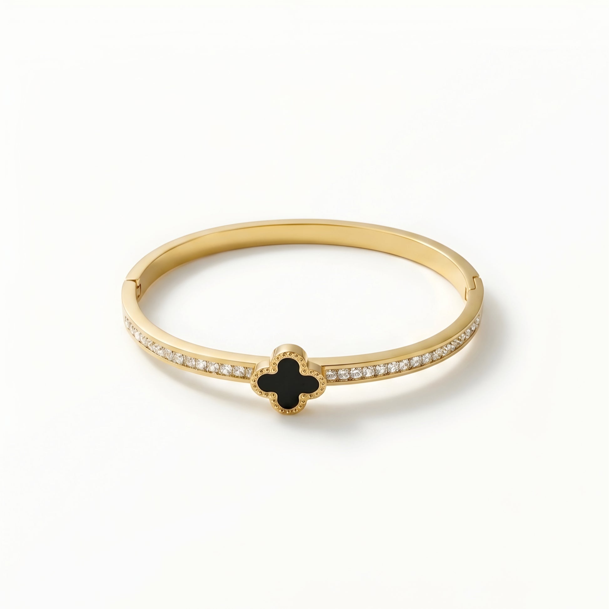 Gold plated black clover crystal bangle bracelet for women with sparkling zircon stones, worn on a model, perfect for daily wear and elegant styling.