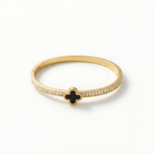 Gold plated black clover crystal bangle bracelet for women with sparkling zircon stones, worn on a model, perfect for daily wear and elegant styling.