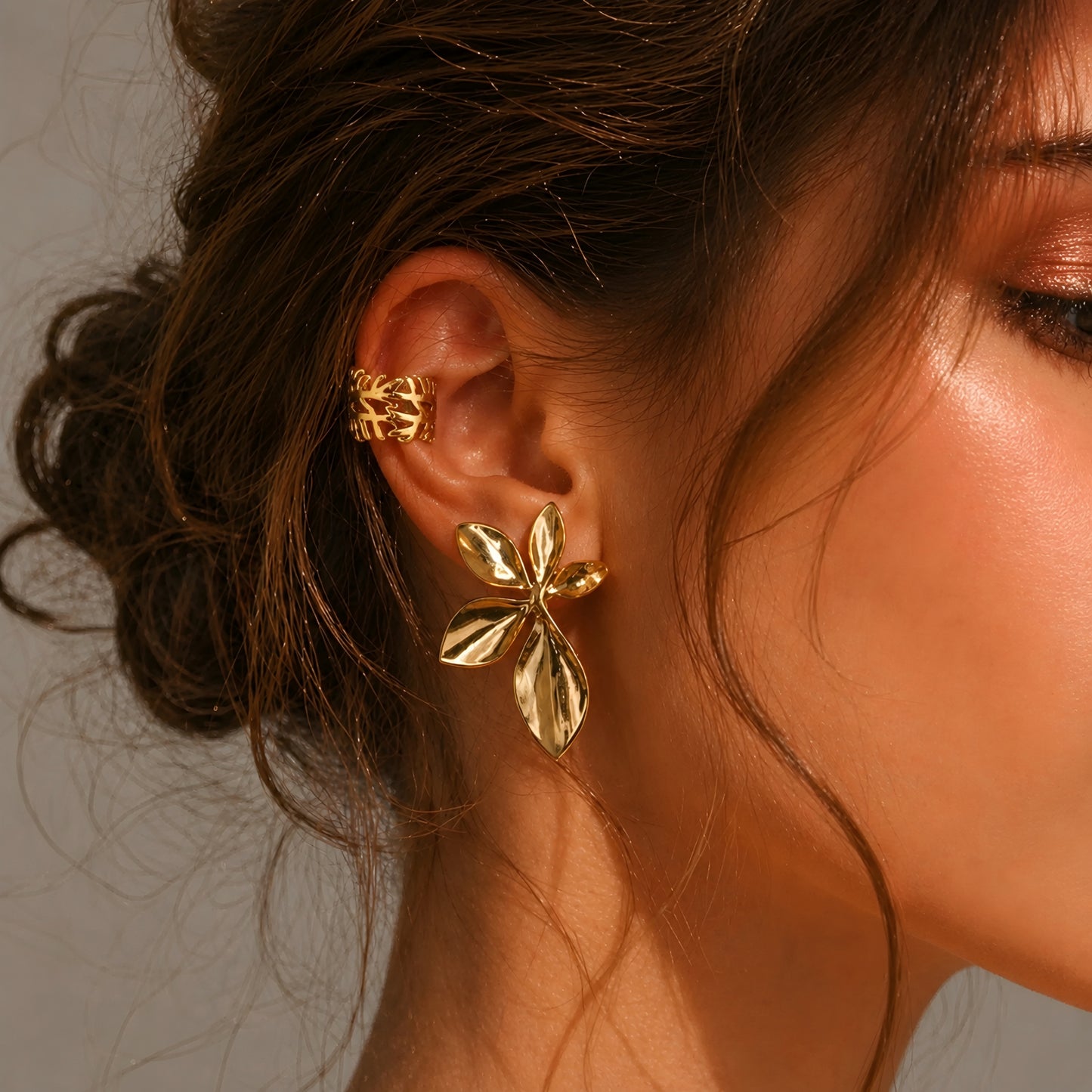 Gold plated leaf ear cuff for women with botanical design, lightweight statement ear cuff, elegant anti tarnish fashion jewellery for daily wear and party wear.