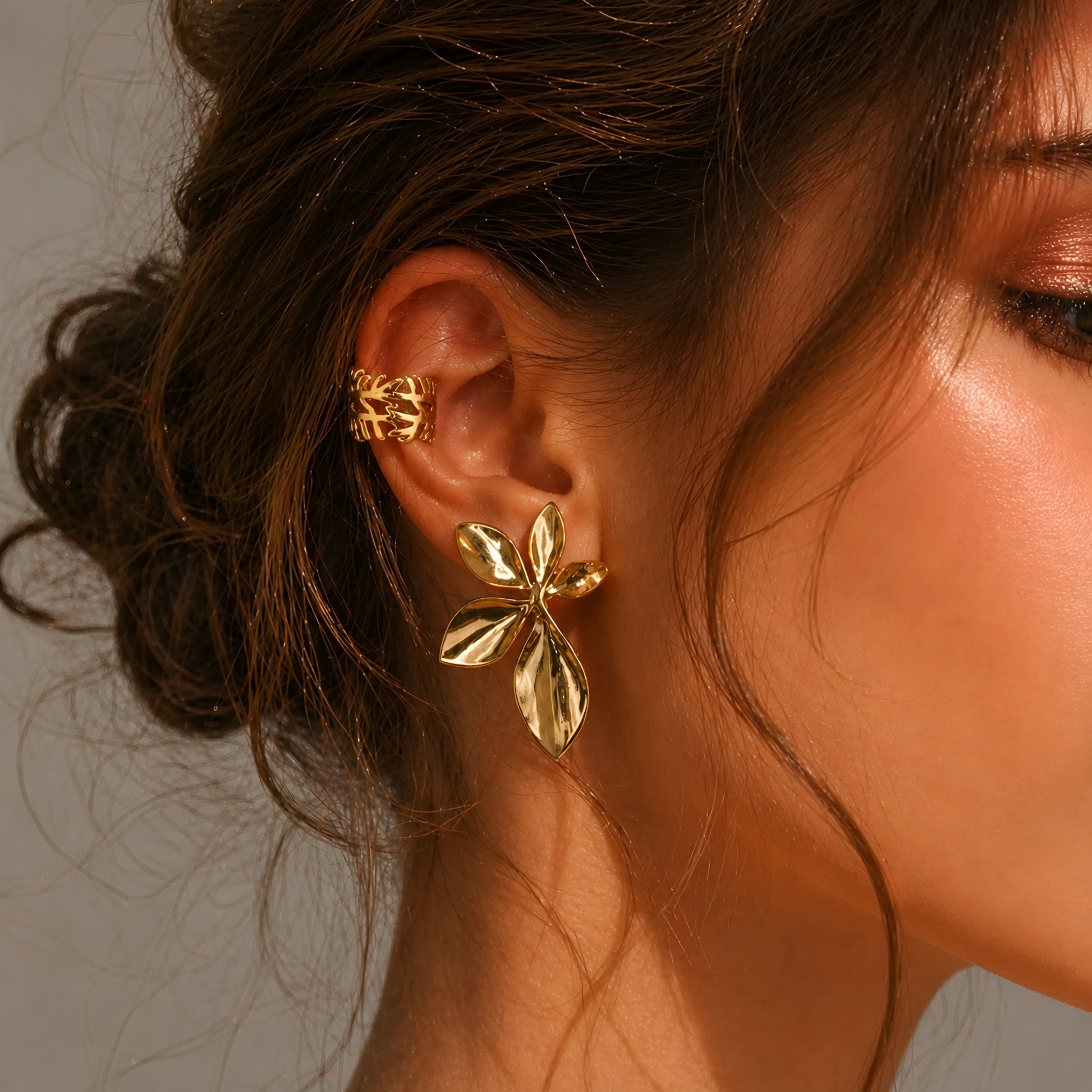 Gold plated leaf ear cuff for women with botanical design, lightweight statement ear cuff, elegant anti tarnish fashion jewellery for daily wear and party wear.