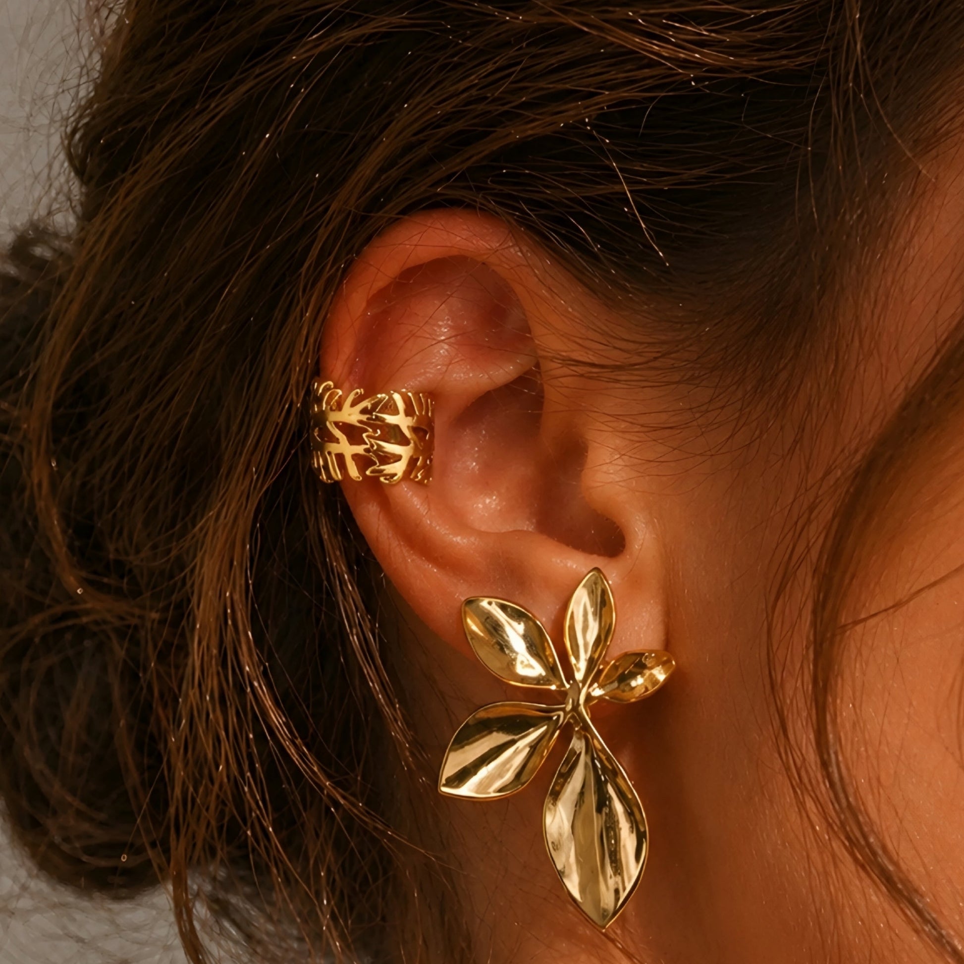 Gold plated leaf ear cuff for women with botanical design, lightweight statement ear cuff, elegant anti tarnish fashion jewellery for daily wear and party wear.