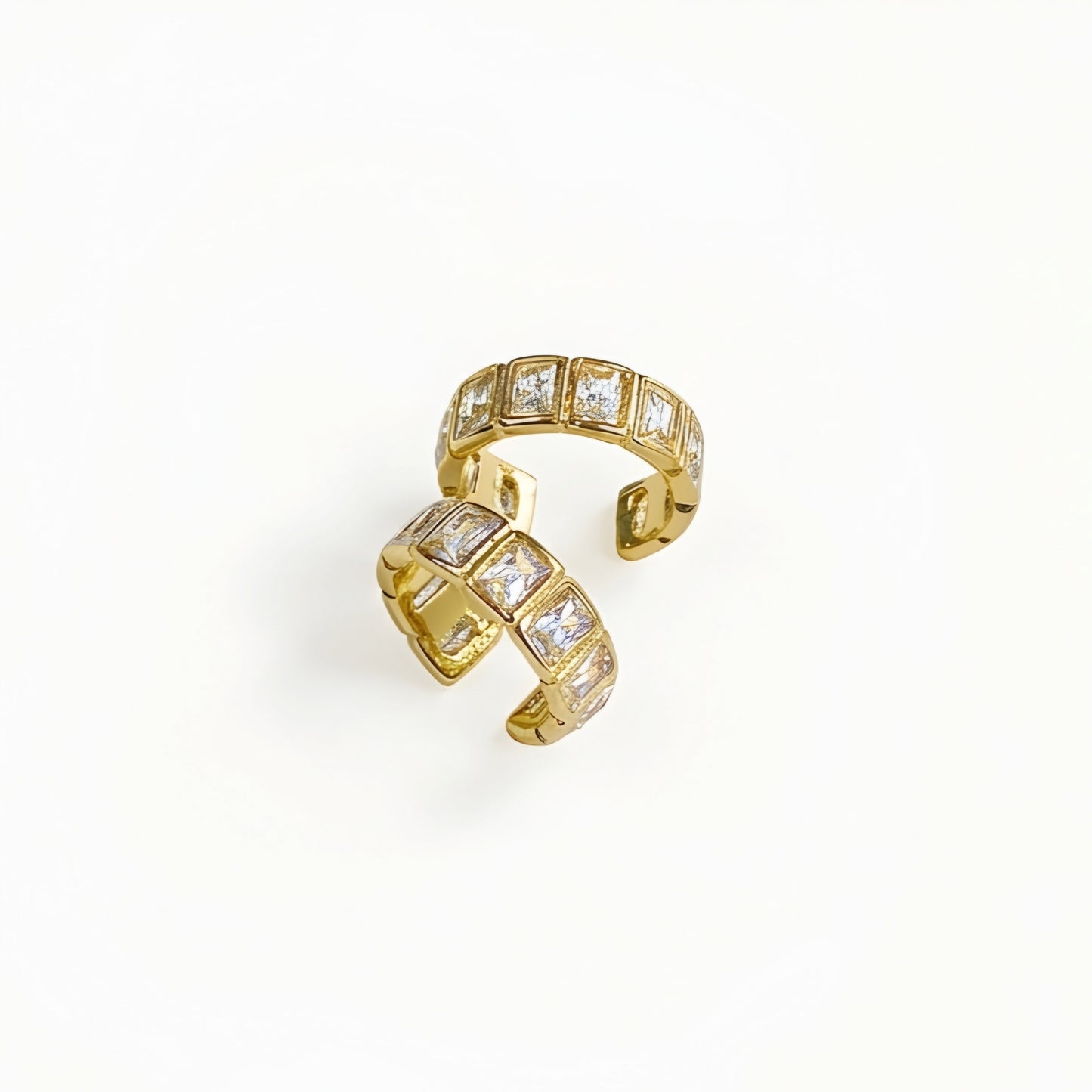 Gold plated ear cuff with square-cut clear crystals for women, anti-tarnish no-piercing ear cuff, lightweight minimalist fashion jewellery for everyday and party wear.