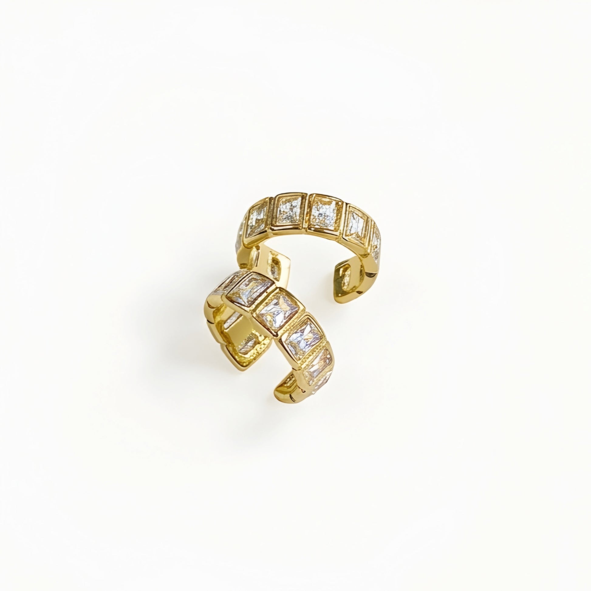 Gold plated ear cuff with square-cut clear crystals for women, anti-tarnish no-piercing ear cuff, lightweight minimalist fashion jewellery for everyday and party wear.