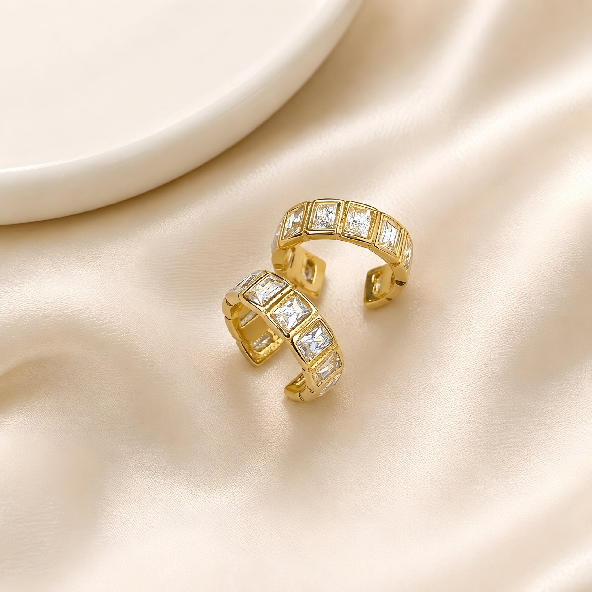 Gold plated ear cuff with square-cut clear crystals for women, anti-tarnish no-piercing ear cuff, lightweight minimalist fashion jewellery for everyday and party wear.