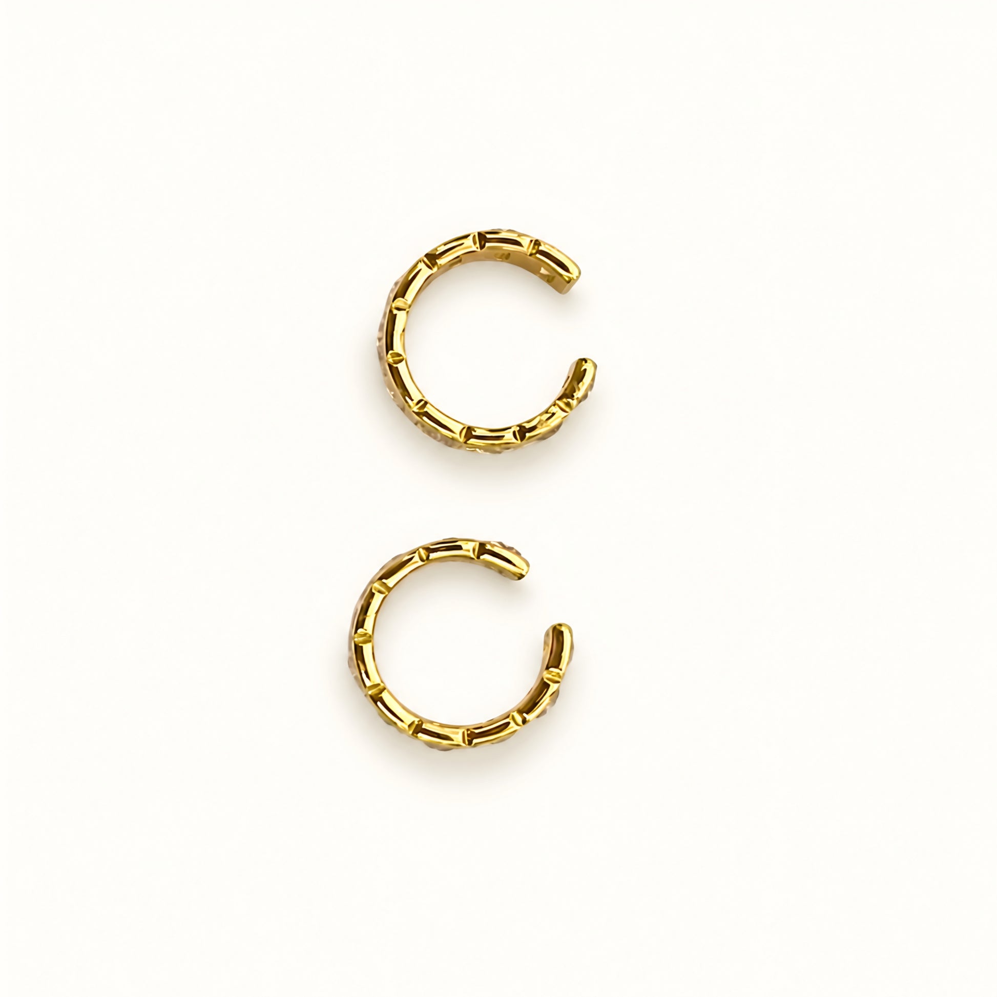 Gold plated ear cuff with square-cut clear crystals for women, anti-tarnish no-piercing ear cuff, lightweight minimalist fashion jewellery for everyday and party wear.