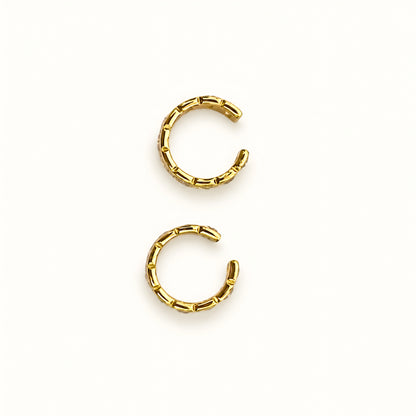 Gold plated ear cuff with square-cut clear crystals for women, anti-tarnish no-piercing ear cuff, lightweight minimalist fashion jewellery for everyday and party wear.