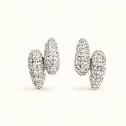 Silver toned anti tarnish pave stud earrings with diamond-look stones and push-back closure for women.