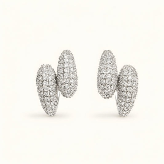 Silver toned anti tarnish pave stud earrings with diamond-look stones and push-back closure for women.