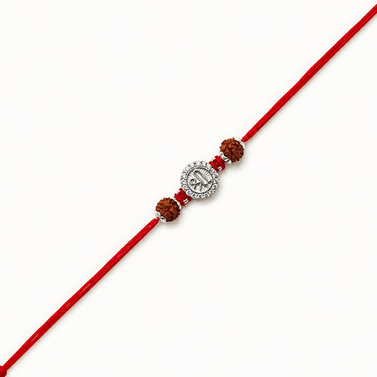 Silver Shree Rudraksha Rakhi featuring the sacred Shree symbol, original Rudraksha beads, and handcrafted red thread for Raksha Bandhan