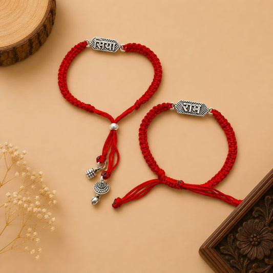 Silver Siya Ram Couple Rakhi Bracelet Set with engraved Siya and Ram nameplates, adjustable red braided thread and silver charms for Raksha Bandhan