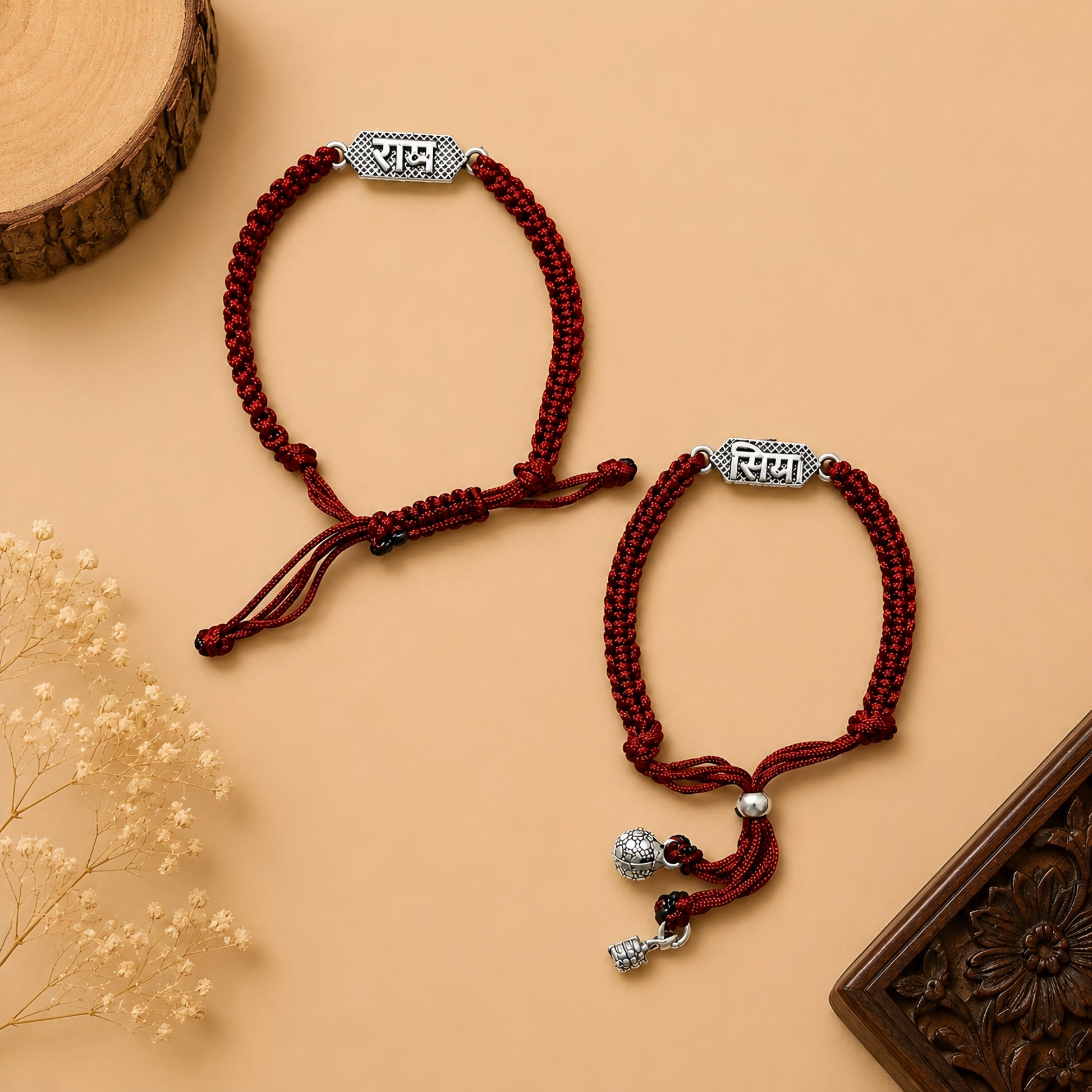 Silver Siya Ram Couple Rakhi Bracelet Set with engraved Siya and Ram nameplates, handcrafted maroon braided thread, adjustable closure and silver charms for Raksha Bandhan