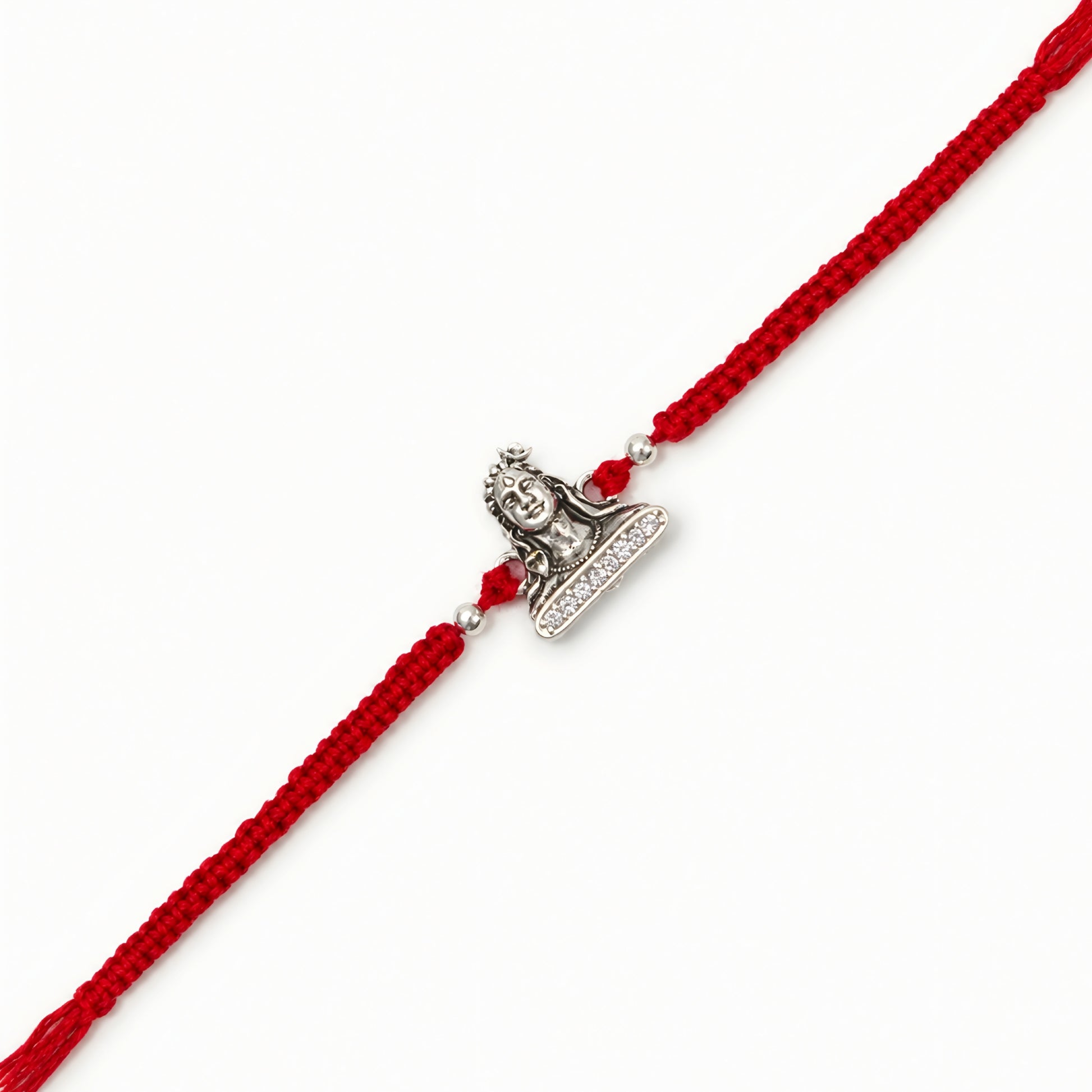 Silver Adiyogi stone Rakhi with Lord Shiva centerpiece and adjustable red thread for brother on Raksha Bandhan