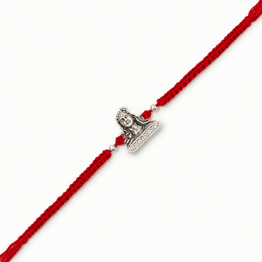 Silver Adiyogi stone Rakhi with Lord Shiva centerpiece and adjustable red thread for brother on Raksha Bandhan