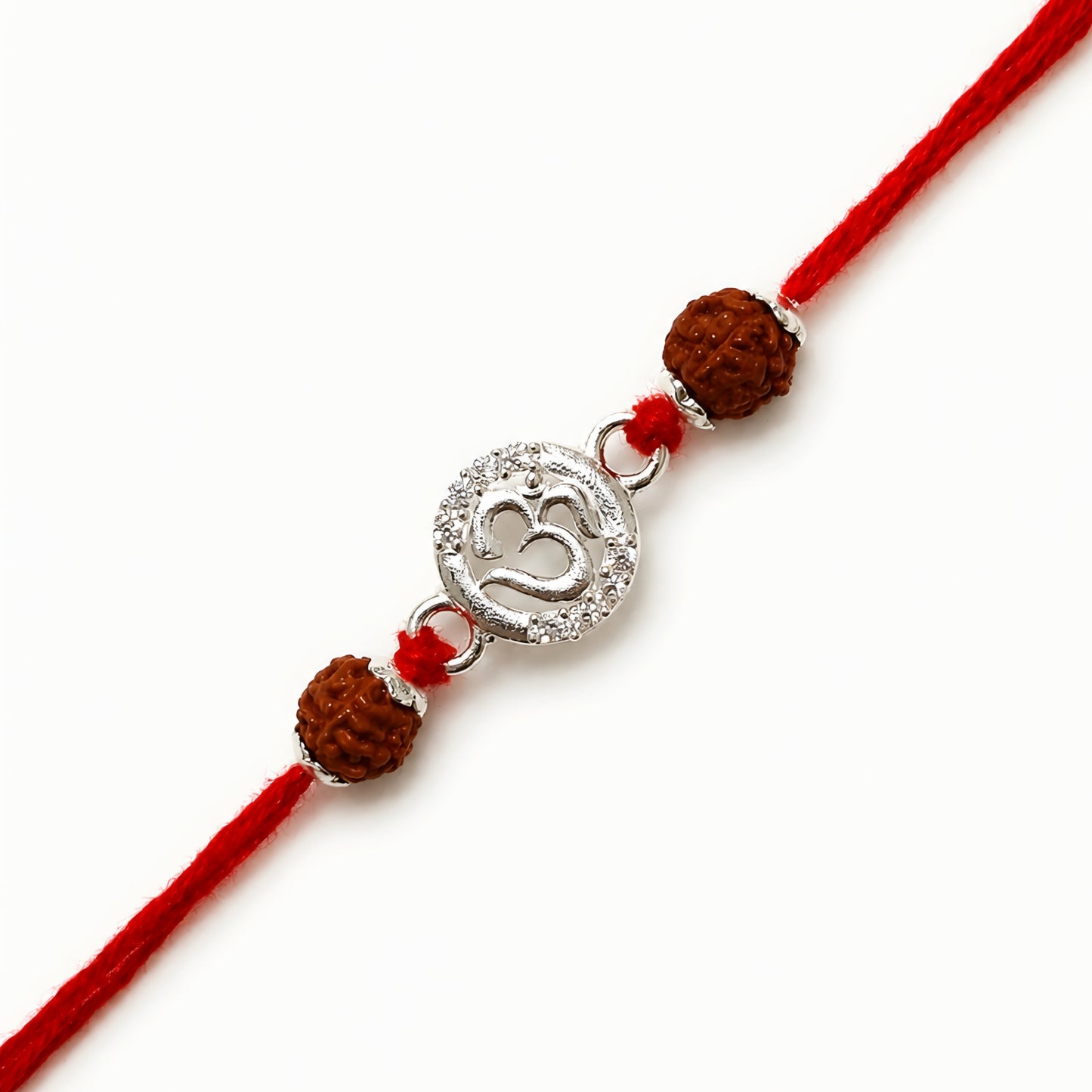 Sterling Silver Om Rudraksha Rakhi with circular silver Om centrepiece, two Rudraksha beads and red thread for brother