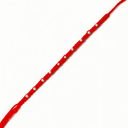 92.5 silver Rakhi with red braided thread and silver bead detailing