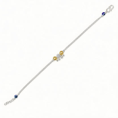 Silver Bhabhi Rakhi with blue evil eye beads and gold-tone beads