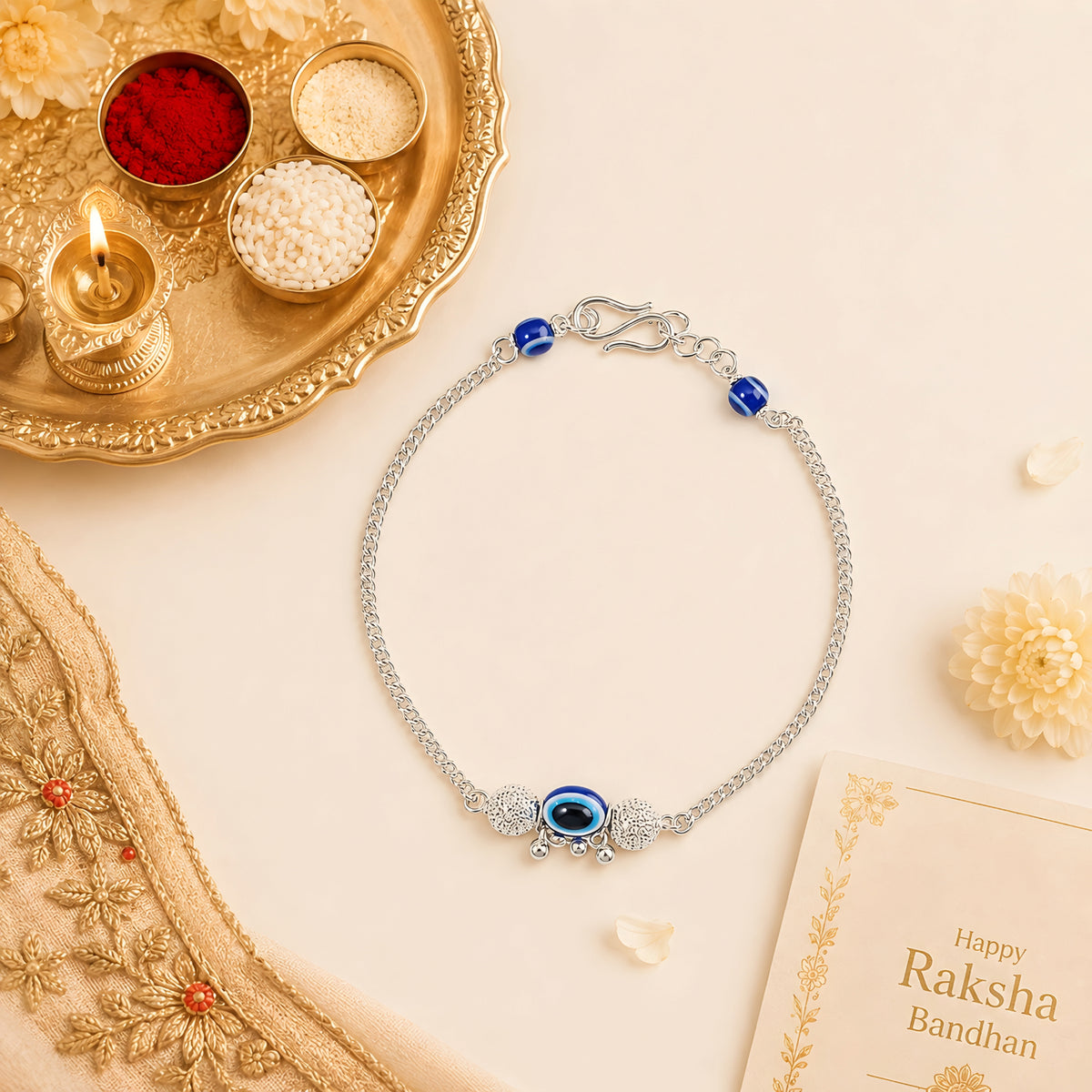 Silver Bhabhi Rakhi with blue evil eye design for Raksha Bandhan