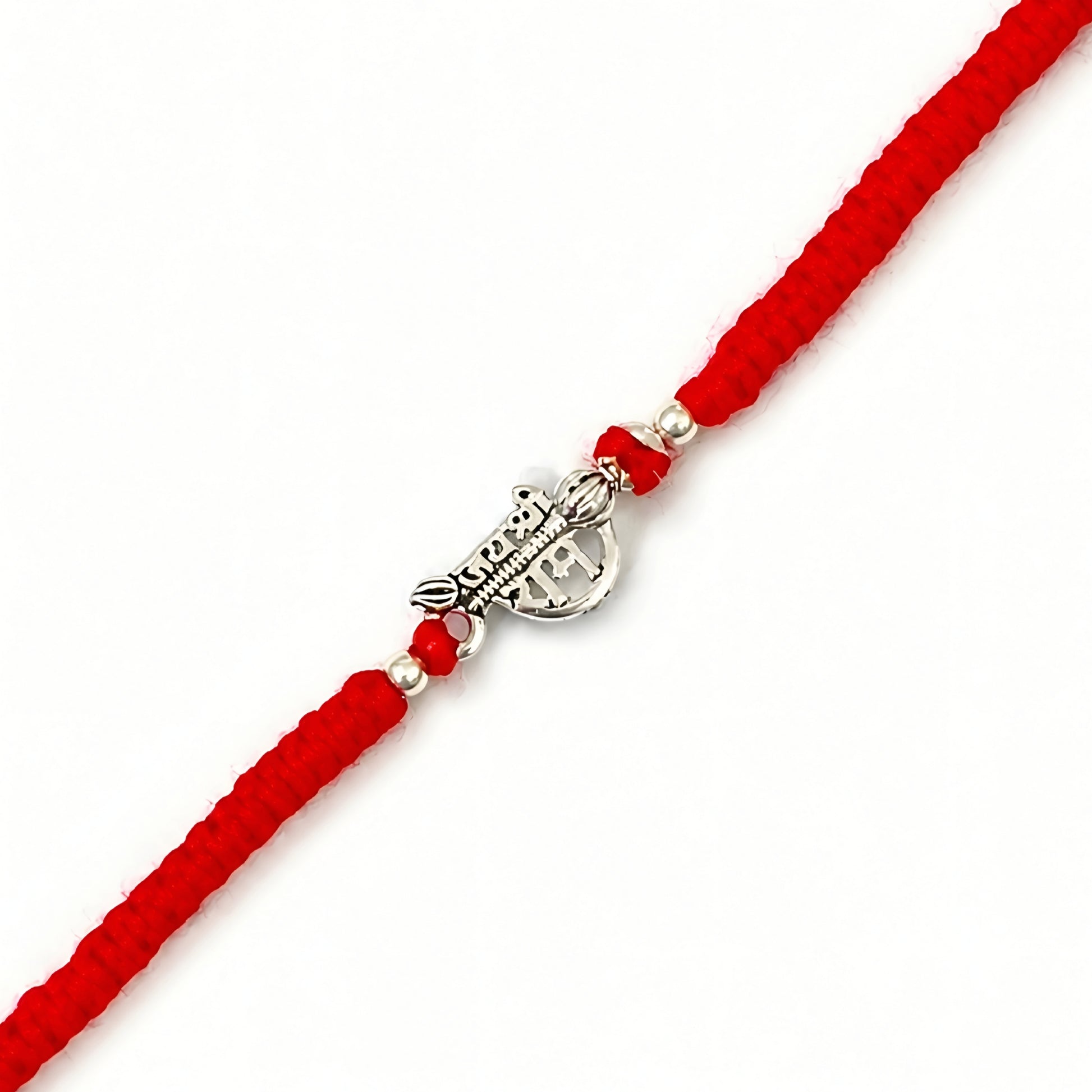 Shree Ram silver Rakhi with red braided thread and silver centerpiece