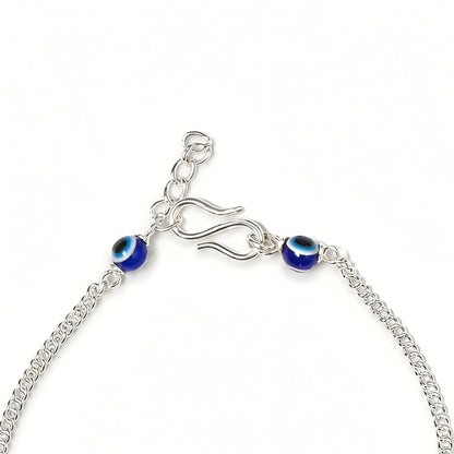 Silver Bhabhi Rakhi with blue evil eye design for Raksha Bandhan