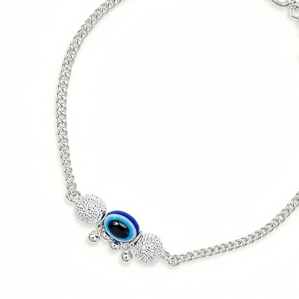 Silver Bhabhi Rakhi with blue evil eye design for Raksha Bandhan