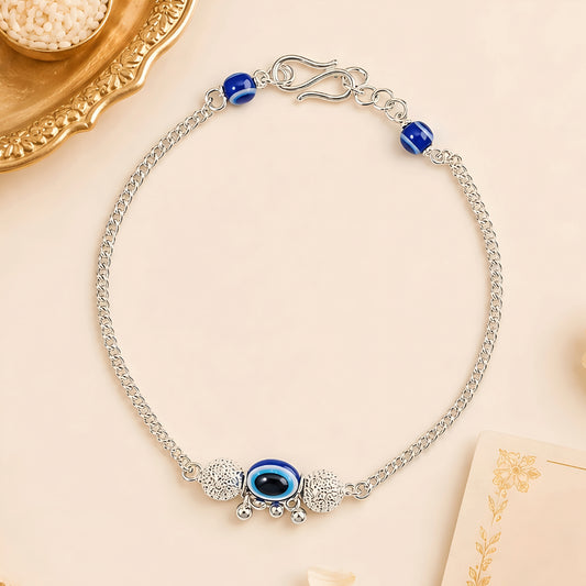 Silver Bhabhi Rakhi with blue evil eye design for Raksha Bandhan
