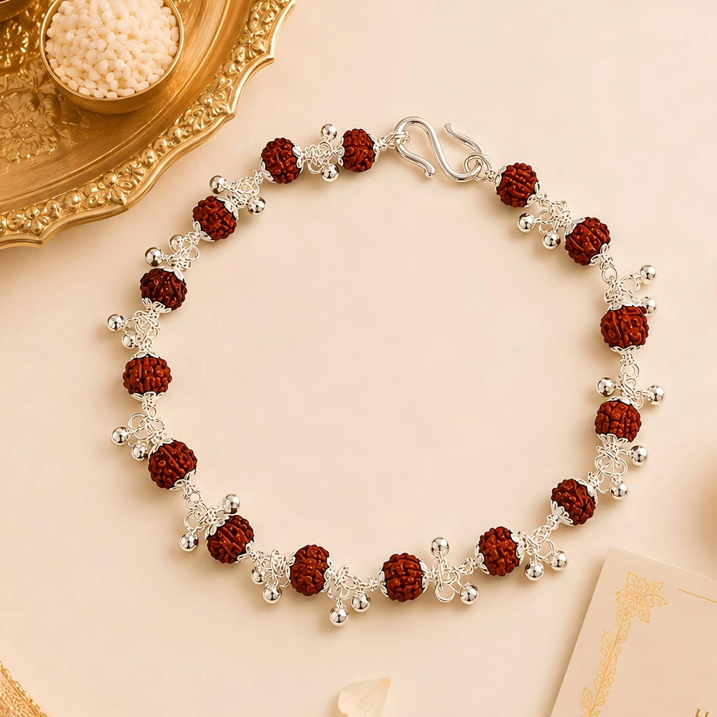 Silver Rudraksha Bhabhi Rakhi with traditional beads and silver detailing