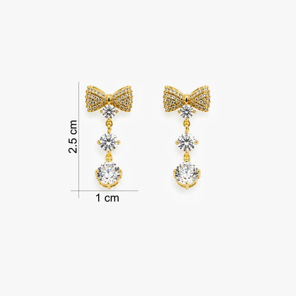 18 KT gold plated crystal bow drop earrings for women with anti tarnish finish featuring sparkling cubic zirconia stones