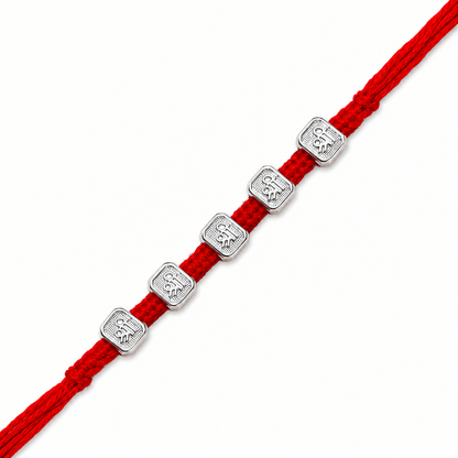 Silver Panch Shri Rakhi featuring five Shri silver charms on a handcrafted red braided thread for Raksha Bandhan