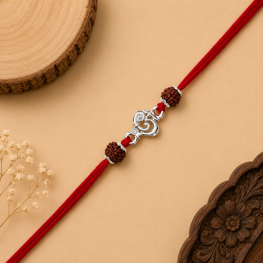 Silver Om stone Rakhi with original Rudraksha beads and red thread for brother on Raksha Bandhan