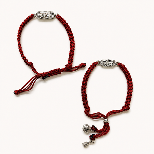 Silver Siya Ram Couple Rakhi Bracelet Set with engraved Siya and Ram nameplates, handcrafted maroon braided thread, adjustable closure and silver charms for Raksha Bandhan