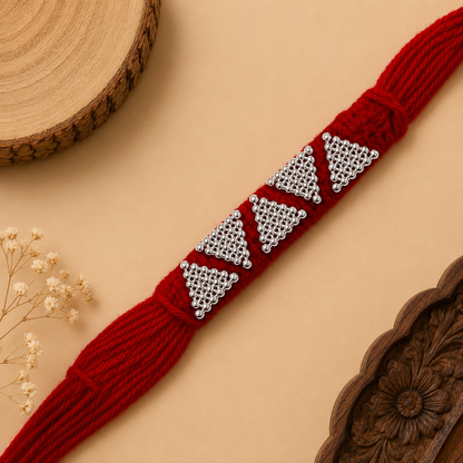 Sterling Silver Panch Trikona Mauli Rakhi with five silver motifs and broad red woven thread for brother