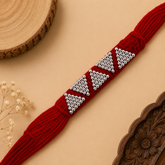 Sterling Silver Panch Trikona Mauli Rakhi with five silver motifs and broad red woven thread for brother